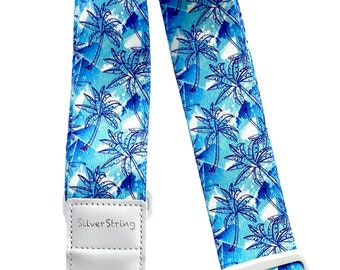 Silverstring Custom 2” Tropical Blue Palms Guitar Strap. The perfect strap for any guitar. Easy adjustment, fits all sizes.