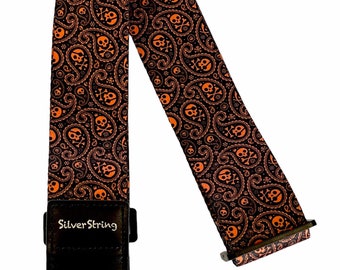 Silverstring Custom 2” Orange Paisley Skulls Guitar Strap. The perfect strap for any guitar. Easy adjustment, fits all sizes.