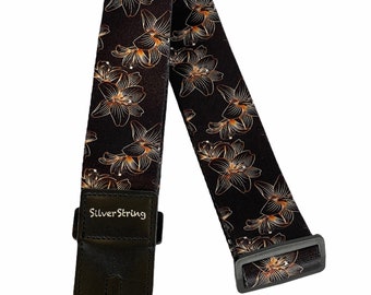 Silverstring Custom 2” Gold Flowers Guitar Strap. The perfect strap for any guitar. Easy adjustment, fits all sizes.