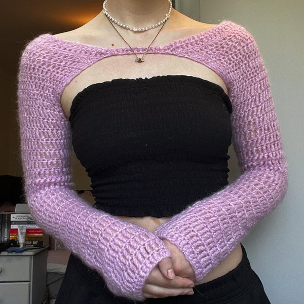 Haussement d'épaules / manches au crochet.