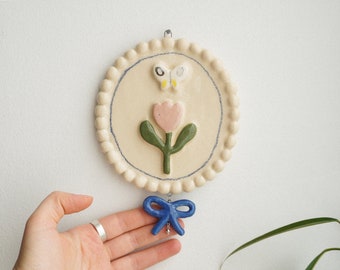 Ceramic Wall Hanging with Flower, Butterfly and blue Bow Pendant, Handmade ceramics, Сeramic wall art, Cottagecore Boho decor, Nursery decor