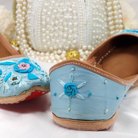 Handmade Floral Punjabi Jutti: Light Blue Embroidered Mojari (size