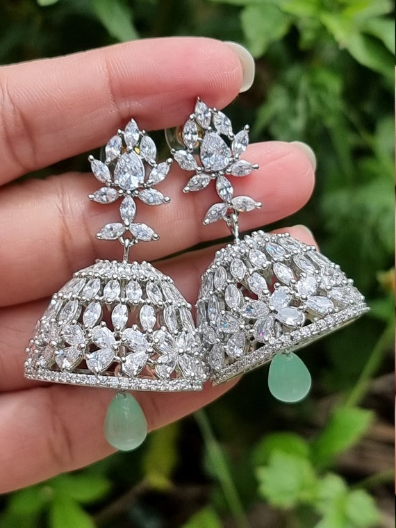 CZ,Emerald Stones,With Pearls,Thilagam Flower Design jumka Premium Quality  GJ Polished Earrings Set Buy Online