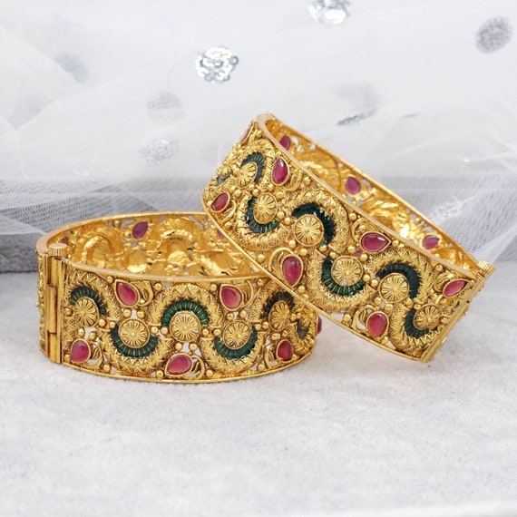 Lightweight broad sales gold bangles