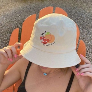 Gasp!! He touched the butt ... bucket hat