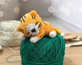 green stuffed tiger