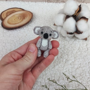 Mini plush stuffed koala. Cute tiny soft animal for doll collection. Miniature pocket pet friend. Lovely small koala toy.