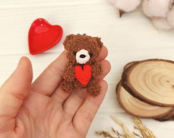 Mini plush teddy bear of love and care. Pocket hug