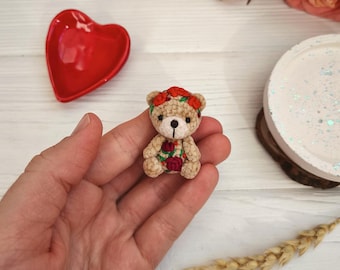 Mini artist teddy bear toy with flowers. Unique crochet collectable animal.