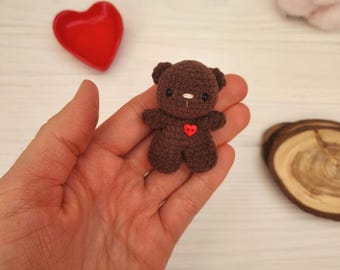 Plushie teddy bear with heart pocket toy. Stuffed keychain