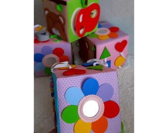 Sensory Busy Cube 15x15cm (5.9x5.9 inches) with the big convenient clasp - removable parts are fastened with a cords to the book