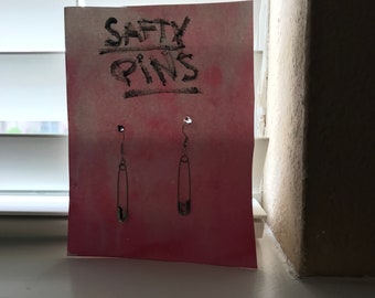 safety pin earrings (highly sanitary)(not worn)