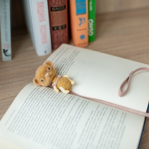 he can lie down while you read you book