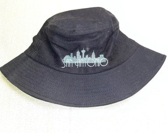 Sombrero de cubo personalizado del horizonte de la ciudad