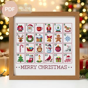 May include: A framed cross-stitch pattern featuring a Christmas advent calendar. Each square contains a festive image, such as Santa, a snowman, and a Christmas tree. The words "MERRY CHRISTMAS" are stitched at the bottom.
