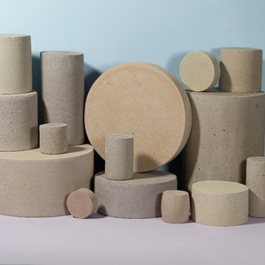 unique textured props made of concrete. The multicolor geometric design of these props adds a touch of style and sophistication to your studio shots. these props are perfect for adding depth and interest to your product photos.