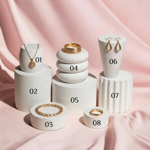 Minimal concrete display riser set with numbered pieces, jewelry display stand for necklace, rings and earrings, boutique retail display system in neutral tones