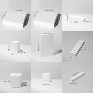 Pode incluir: Uma cole&ccedil;&atilde;o de formas geom&eacute;tricas brancas, incluindo cubos e prismas retangulares, com dimens&otilde;es em cm e polegadas. Inclui um bloco de 15 cm x 15 cm e um cubo de 10 cm. Ideal para fotografia de produtos.