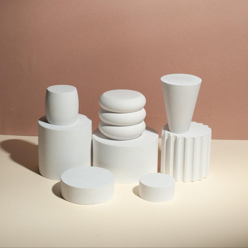 Professional photography props for product shoots that need to look expensive, not generic.

Real concrete texture. Each piece is unique. The micro-pores create depth in your shots - products exist in actual space, not floating in a void. Shadows work without fighting your lighting setup.
