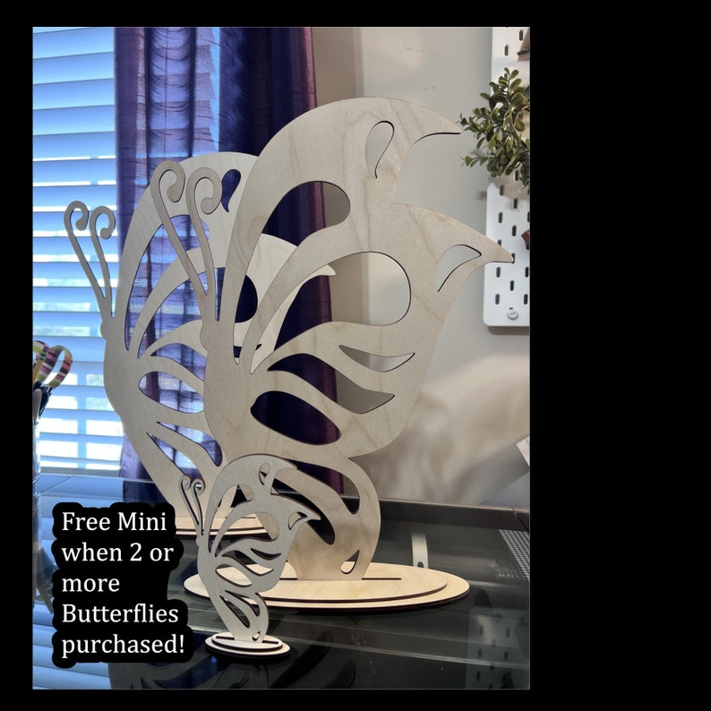 May include: Two wooden butterfly cutouts, one large and one small, with a free mini butterfly offer when purchasing two or more butterflies.  Free Mini when 2 or more Butterflies purchased!