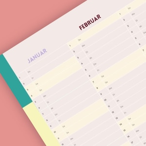 May include: A close-up of a calendar page with the months of January and February visible. The calendar has a light purple background with white lines and text. The text includes the days of the week and dates.