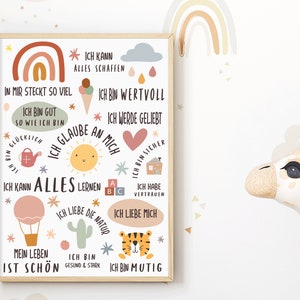 May include: A colorful poster with a rainbow and various illustrations, including a sun, a hot air balloon, a cactus, and a tiger. The poster features positive affirmations in German, such as "Ich bin gut so wie ich bin" (I am good the way I am) and "Ich glaube an mich" (I believe in myself).