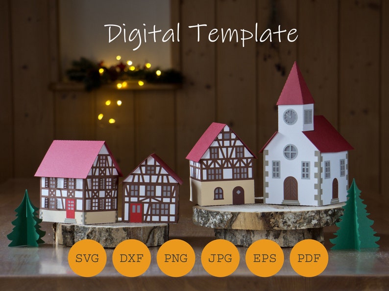 May include: Digital template for a papercraft village scene. The template includes four buildings, including a church with a red roof and a clock tower, and two trees. The template is available in SVG, DXF, PNG, JPG, EPS, and PDF formats.