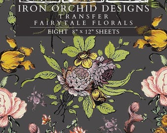 May include: A set of eight 8 inch by 12 inch transfer sheets titled IOD Iron Orchid Designs Fairytale Florals. The sheets feature a dark gray background with various colorful floral illustrations including pink roses, yellow tulips, and purple blossoms.