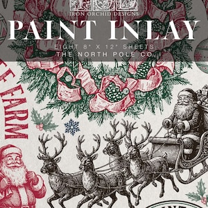 May include: A set of eight 8 inch by 12 inch Iron Orchid Designs paint inlay sheets featuring red and green illustrations of Santa Claus, reindeer pulling a sleigh, Christmas ornaments, holly, snowflakes, and the text The North Pole Co.