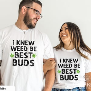 May include: Two white t-shirts with a black and green graphic that says "I knew weed be best buds" and a green marijuana leaf graphic.