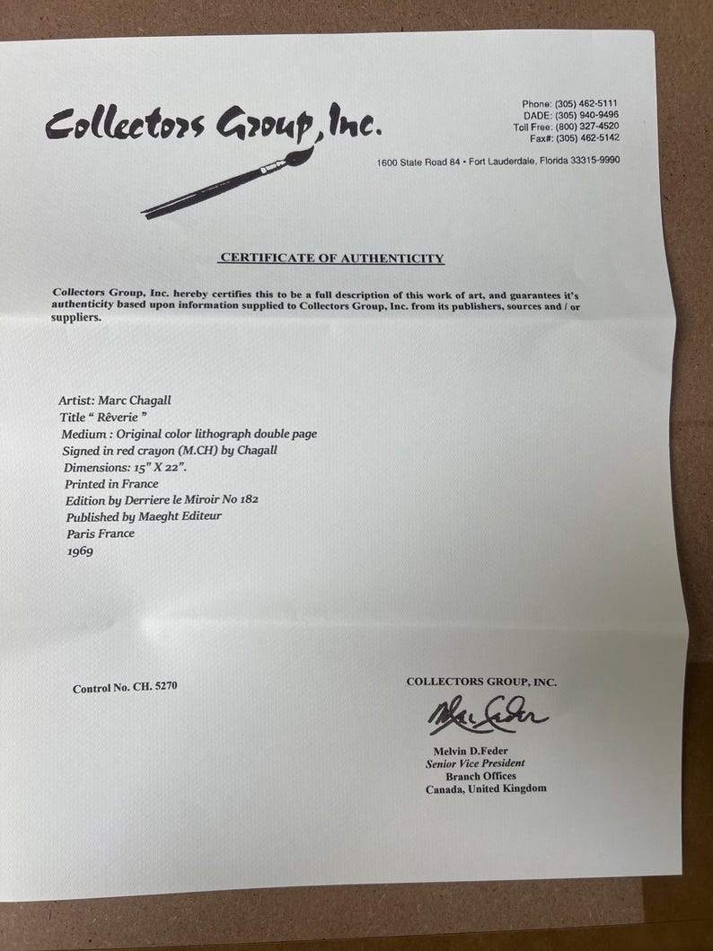 May include: A certificate of authenticity from Collectors Group, Inc. for a Marc Chagall lithograph titled "R&ecirc;verie." The document includes details such as dimensions of 15" x 22", the artist's signature, and the print's origin in France.