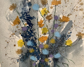 May include: A watercolor painting of a bouquet of wildflowers in a clear glass vase. The flowers are in shades of blue, yellow, and purple. The background is a light gray with hints of blue.