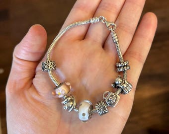 PANDORA Sterling Silver bracelet with pink and angel charms 7.5” 925