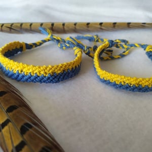 Macramé bracelets in the colors of the Ukrainian flag image 1