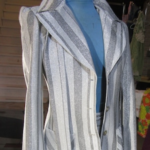 look at this vintage suit / 70ish long skirt silver suit