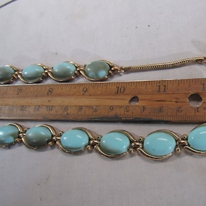 Trifari Signed necklace, bracelet and earrings with tag