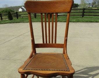 antique oak spindle back chair , leather seat chair