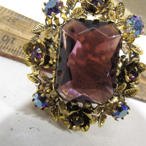 vintage Austria purple glass rhinestone brooch