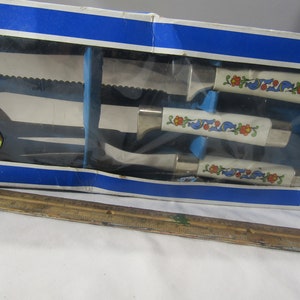vintage stainless steel cutlery set in box