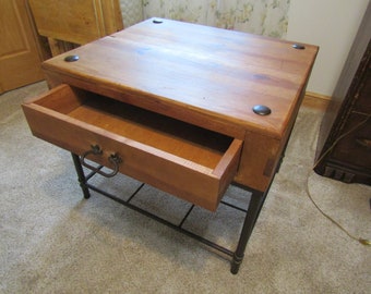 Vintage rustic Wood coffee table with metal cross bars on bottom