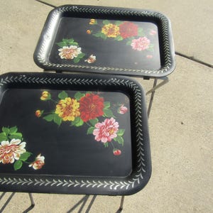 vintage black tv trays/flower metal trays