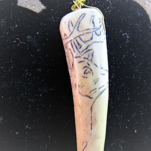 vintage deer head carved on bone on sterling silver chain