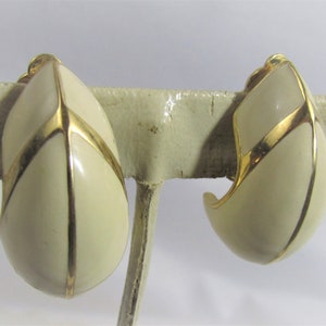 bold big vintage St. john enamel cream clip earrings