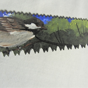 hand painted birds on saw blade