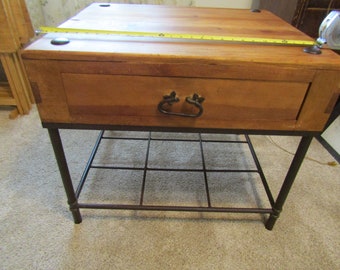 Vintage rustic Wood coffee table with metal cross bars on bottom