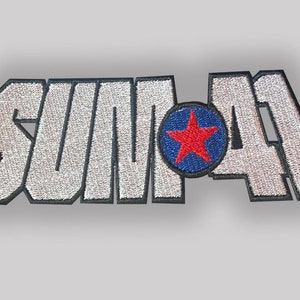May include: White embroidered patch with the word "SUM 41" in black outlined letters and a red star in a blue circle.