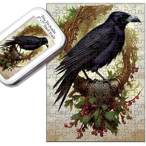 May include: A black raven perched on a branch with red berries and a Celtic knot design. The raven is surrounded by green leaves and vines. The image is a jigsaw puzzle with the text "Tiny Tin Puzzles 5" x 7" Travel Puzzle".