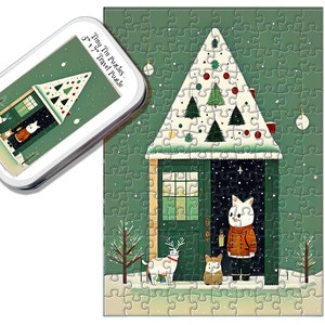 May include: A green and white Christmas-themed jigsaw puzzle with a house covered in snow and a decorated Christmas tree. The puzzle features three animals: a cat, a deer, and a dog. The puzzle is in a tin box with the text "Tiny Tin Puzzles - 5" x 7" Travel Puzzle".
