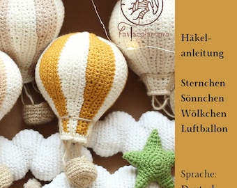 May include: Crochet pattern PDF for making a set of amigurumi hot air balloons, clouds, and a star. The pattern is in German and includes instructions for making a star, sun, cloud, and hot air balloon.