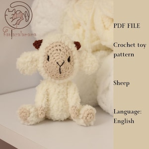 May include: Crochet pattern PDF for a white sheep toy. The pattern is written in English.